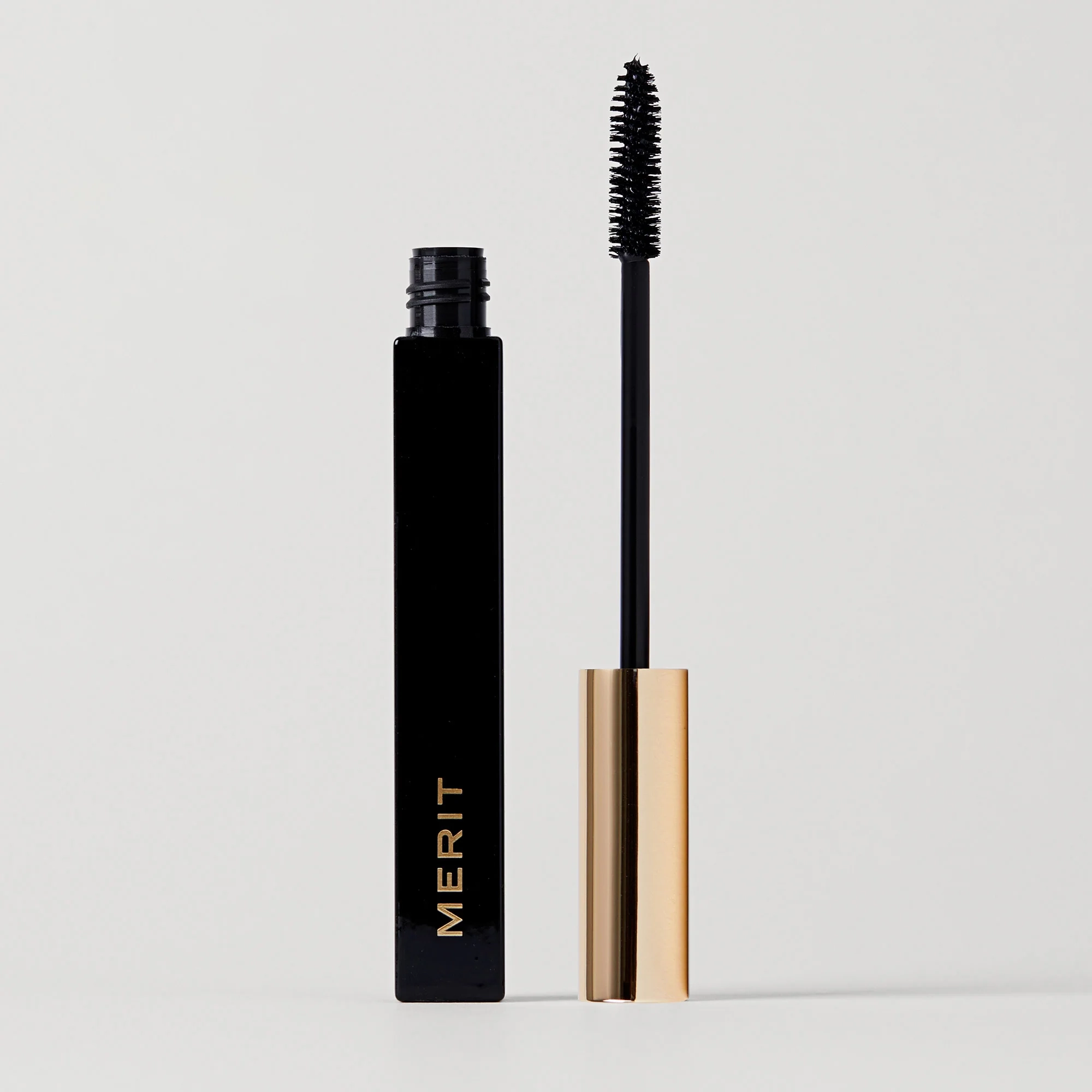Clean Lash mascara wand beside its tube