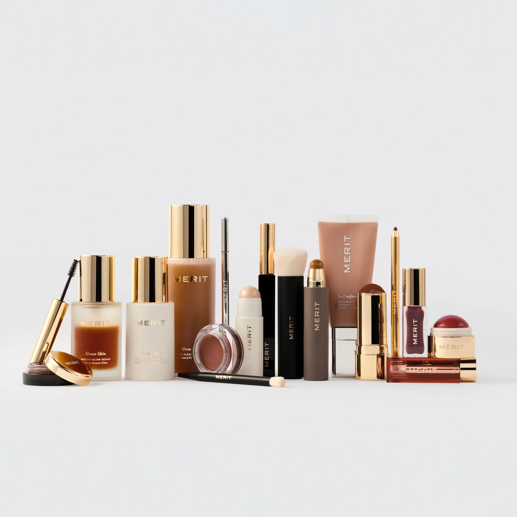 The full MERIT collection arranged in rows on a pale surface